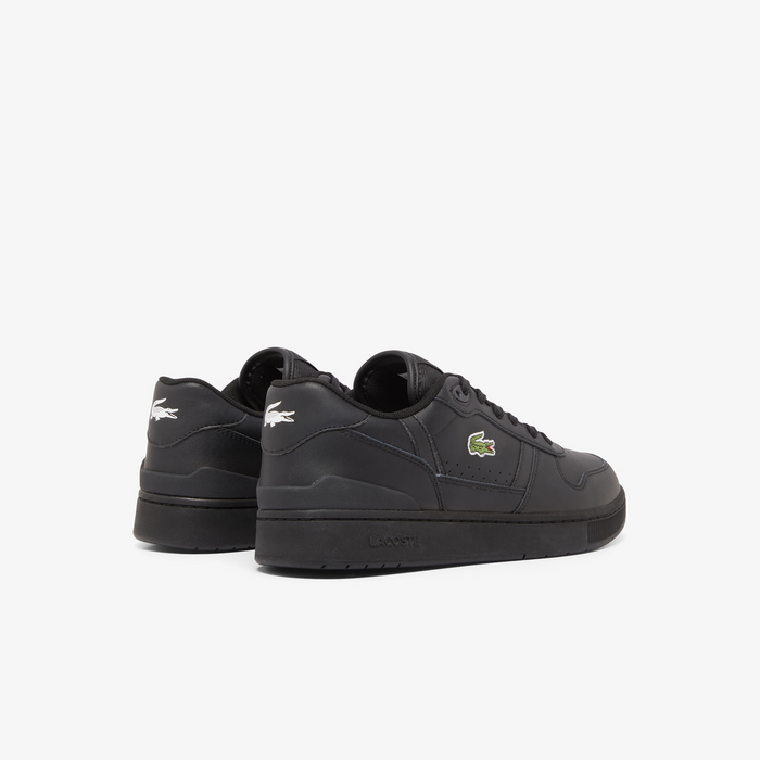 Lacoste T-Clip Set 224 2 SMA sneakers in black with perforated details, green crocodile logo, and embroidered heel branding, back angle.
