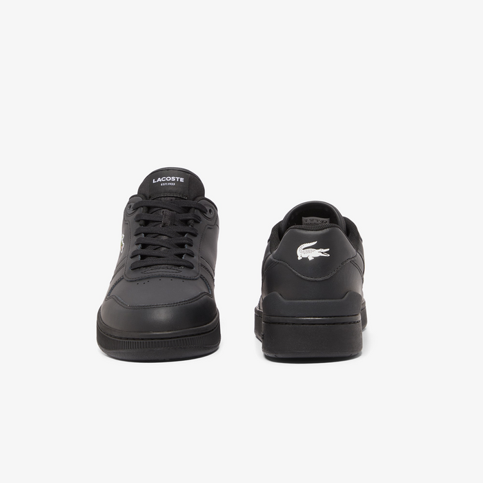 Lacoste T-Clip Set 224 2 SMA sneakers in black with a leather upper, lace-up design, and white crocodile logo, front and back view.