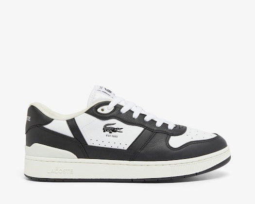 Lacoste T-Clip Set Leather Sneakers in black and white featuring leather overlays, perforated detailing, and signature crocodile logo, side view.