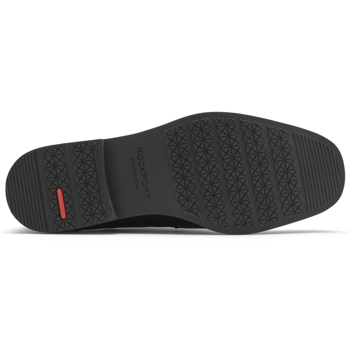 Rockport Taylor Waterproof Wingtip dress shoe outsole with slip-resistant rubber and textured tread pattern in black.