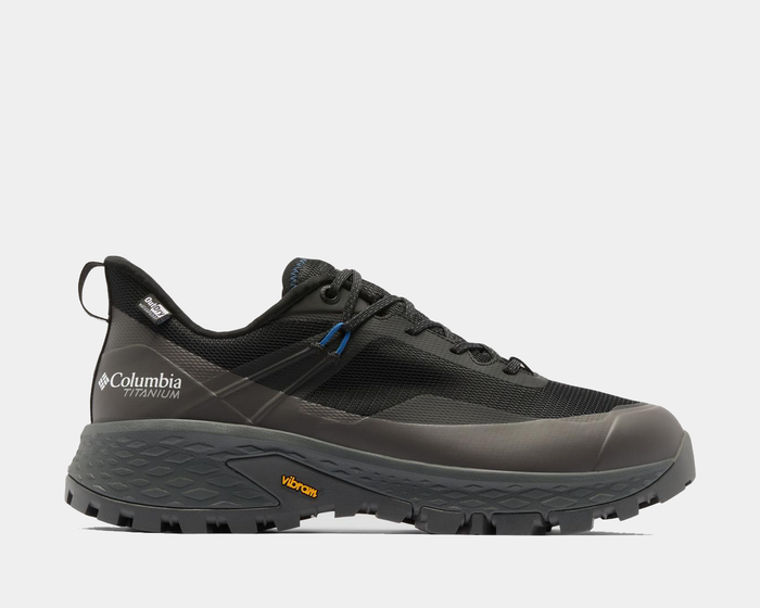 Columbia Tellurix Titanium OutDry shoe in black and gray with waterproof design, Vibram outsole, and durable mesh upper, side view.