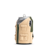 Puffin The Adventurer can cooler in tan and green with mini vest design and functional pockets, front view.