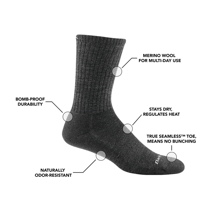 Darn Tough The Standard Crew Light Cushion socks in dark gray with ribbed cuff and light cushioning, side view.