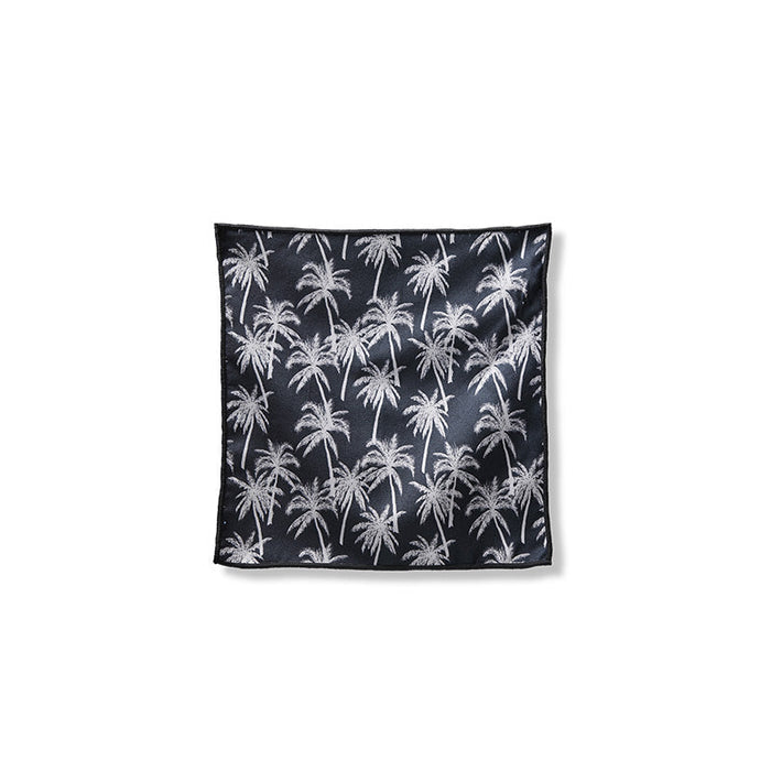 Nomadix Tiny Towel 3-Pack, compact microfiber towel with black and white palm tree pattern, front view.