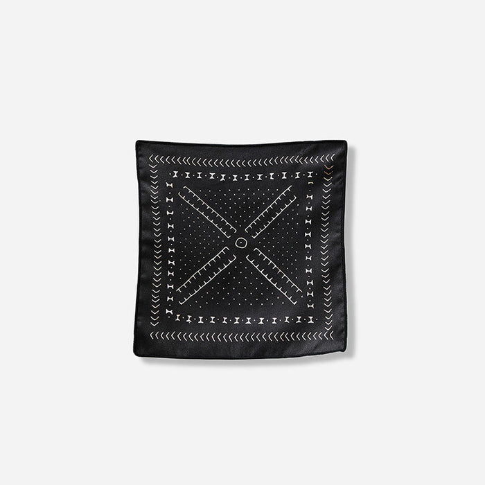 Nomadix Tiny Towel 3-Pack towel in black with white geometric pattern, front view.