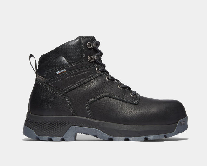 Timberland Pro Titan EV 6" Waterproof Composite Toe Boot in black leather with rugged outsole and reinforced stitching, side view showing durable construction.