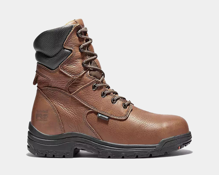 Timberland Pro Titan EV 8" Waterproof Composite Toe boot in brown full-grain leather with black padded ankle collar and durable rubber outsole, side view.