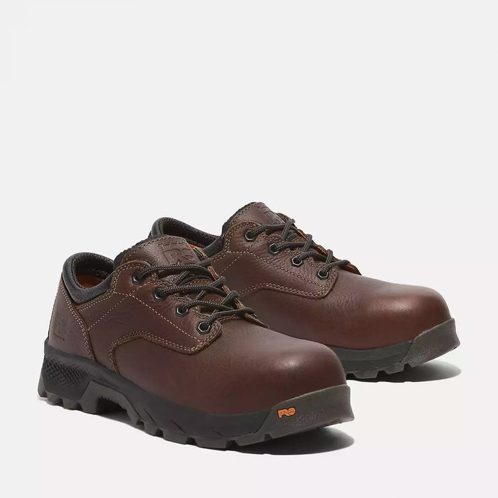Timberland Pro TiTAN EV Composite Toe Oxford shoes in dark brown full-grain leather with slip-resistant outsole, front angle view.