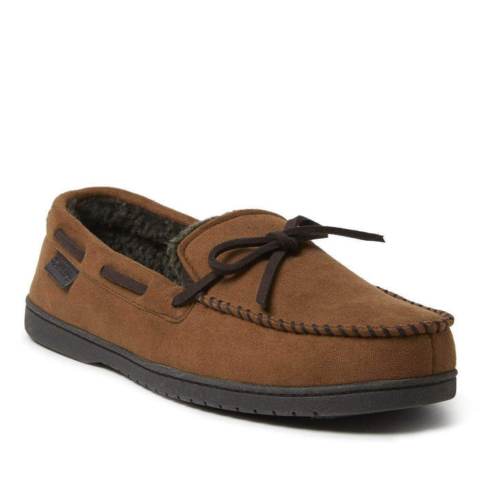 Dearfoams Toby Microsuede Tie Moccasin slippers in chestnut brown with stitched detailing, black outsole, and soft fleece lining, angled front view.