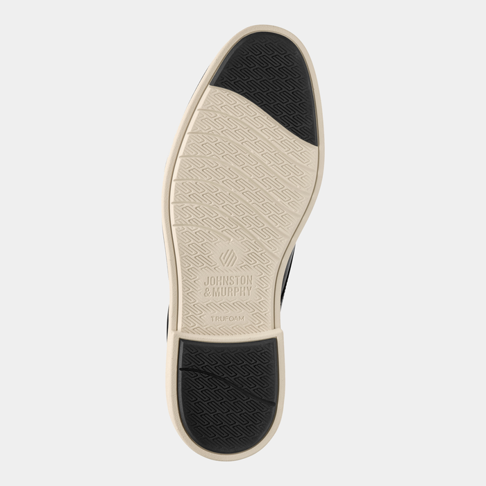Johnston & Murphy Tyson Plain Toe shoe outsole in beige and black with slip-resistant tread and TruFoam cushioning branding, bottom view.