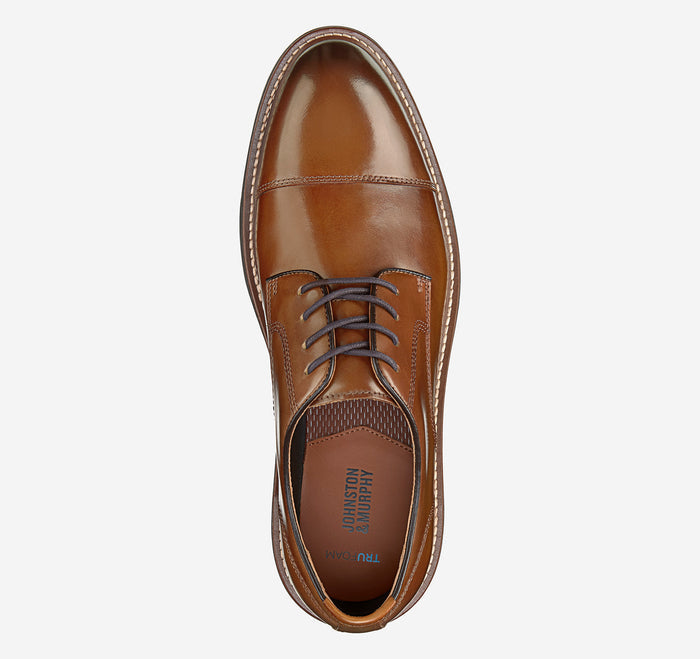 Johnston & Murphy Upton Cap Toe dress shoes in polished tan leather with stitched detailing and lace closure, top view.