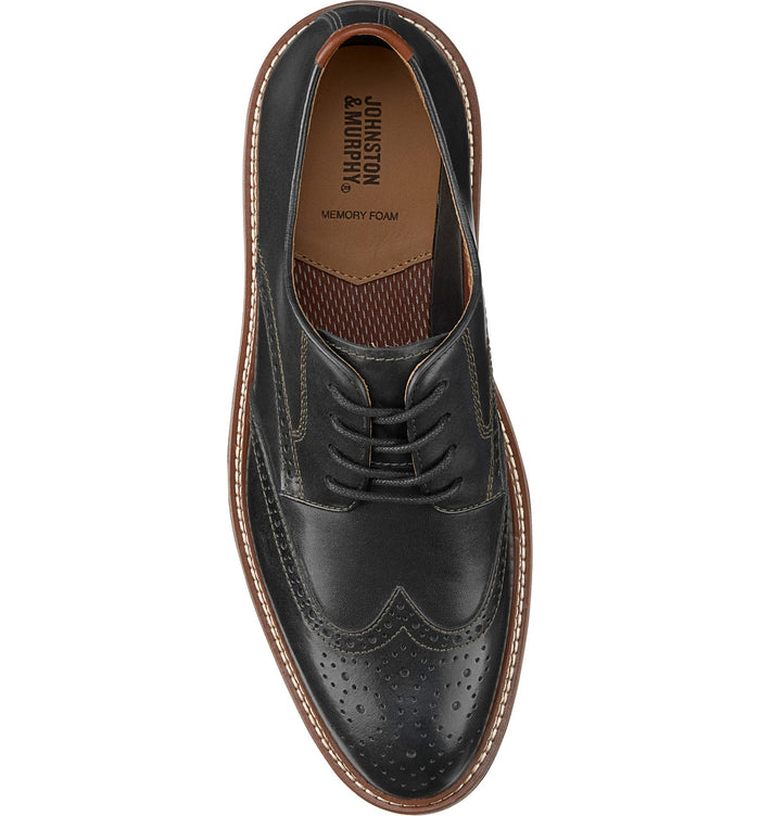 Johnston & Murphy Upton Wingtip dress shoe in black leather with brogue detailing and memory foam insole, top view.