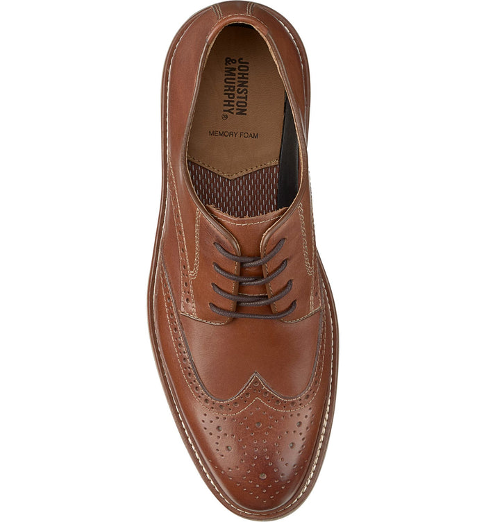 Johnston & Murphy Upton Wingtip dress shoe in tan leather with brogue detailing and memory foam insole, top view.