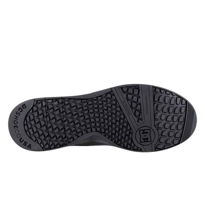 DC WorkCrew Versatile Work Hi Top Comp Toe work boots outsole in black with slip-resistant tread pattern, bottom view.