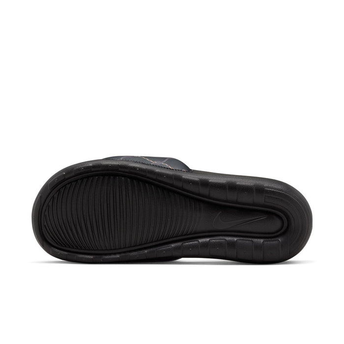 Nike Victori One Printed slides with black rubber outsole featuring textured tread pattern and subtle Nike logo, sole/bottom view.