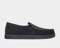 DC Footwear Villain 2 slip-on shoes in black with textured patterned vamp and stitched details, side view.