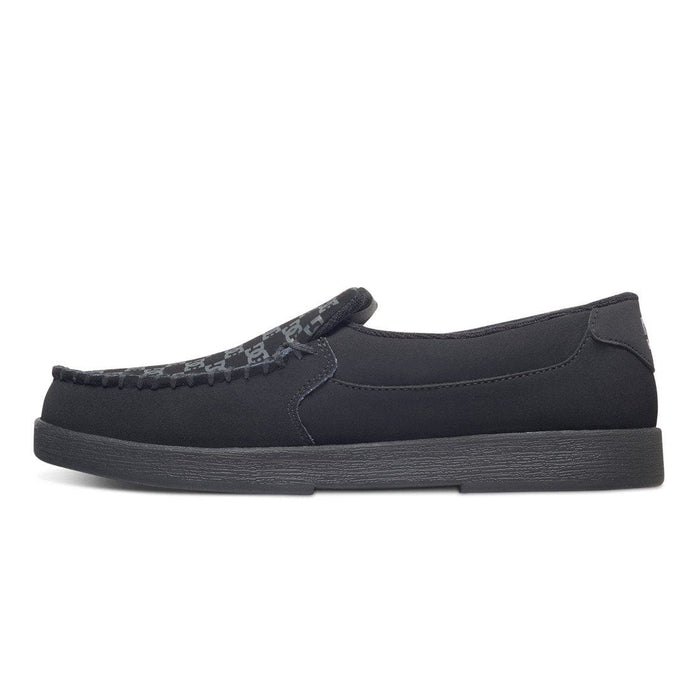DC Footwear Villain 2 slip-on shoes in black with moc toe stitching and printed vamp detail, side view.