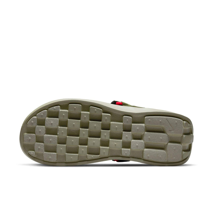 Nike Vista shoes outsole in olive green showing square grip pattern and durable rubber material, bottom view.