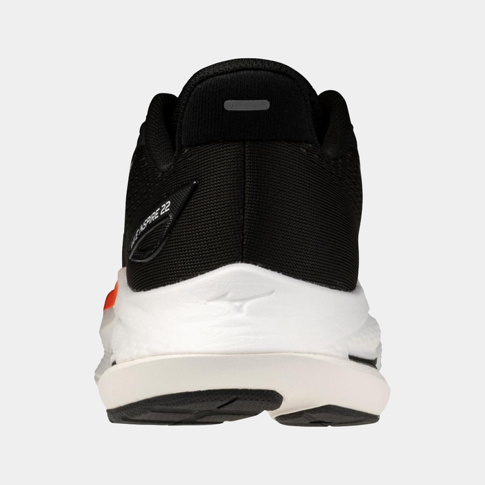 Mizuno Wave Inspire 22 running shoes in black with white midsole and orange accents, back view showing heel counter and logo detailing.