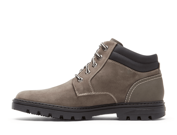 Rockport Weather or Not Waterproof Boot in taupe with lace-up design, padded collar, contrast stitching, and rugged outsole, side view.