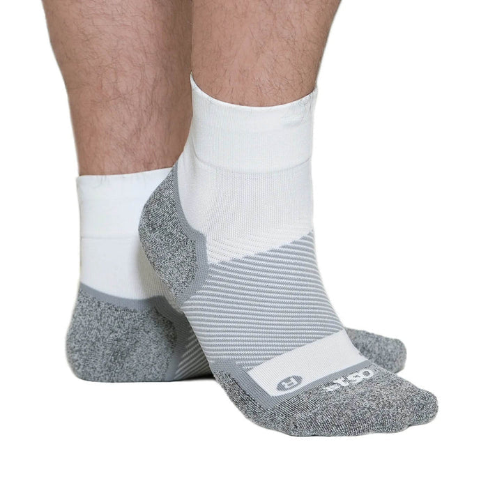 OS1st Wellness Performance Quarter Socks in white and gray with textured cushioned heel, toe, and arch support, lifestyle context showing socks worn.
