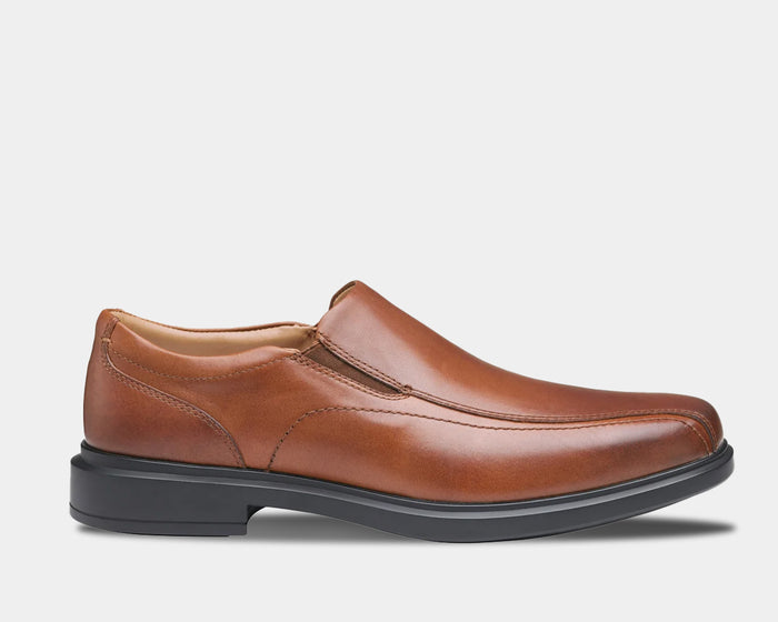 Johnston & Murphy XC4 Stanton 2.0 Waterproof Run-Off Slip-On shoes in brown leather with sleek stitching and black sole, side view.