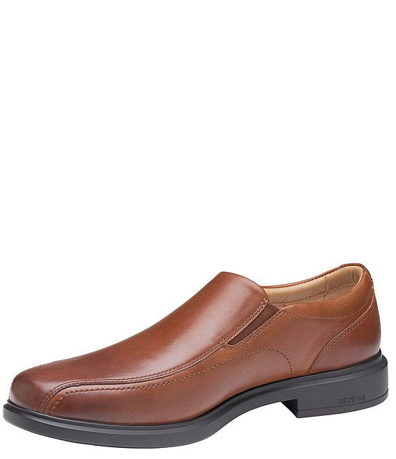 Johnston & Murphy XC4 Stanton 2.0 Waterproof Run-Off Slip-On shoes in tan leather with a sleek design and black outsole, side view.