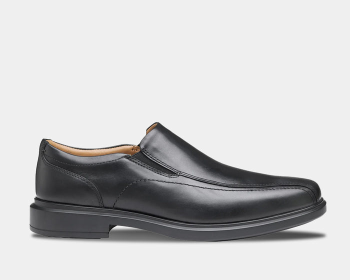 Johnston & Murphy XC4 Stanton 2.0 Waterproof Run-Off Slip-On shoes in black leather with stitched detailing and elastic side panels, side view.